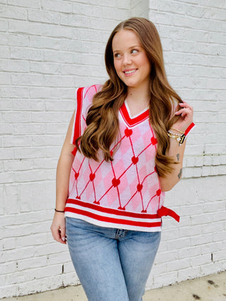 Heart Knit Sweater Vest with Bows- BOW, Bow detail, bow sweater, BOWS, clothing, HEART, heart sweater, HEARTS, knit sweater, knit vest, pink, pink sweater, RED, RED SWEATER, ribbon, Ribbons, Seasonal, sweater top, SWEATER VEST, SWEATER., sweaters, Tops, VALENTINE, Valentine Collection, valentine pullover, VALENTINES, VALENTINES GRAPHIC TEE, valentines sweatshirt, VALENTINES TOP, VEST-Ace of Grace Women's Boutique