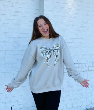 Camo Bow Sweatshirt- beige sweatshirt, BOW, bow top, BOWS, camo, camo shirt, camo top, Camouflage, clothing, comfy sweatshirt, Curvy, fall clothes, Hunt, Hunting, Madelynn, MadelynnGrace, oversized sweatshirt, plus size sweatshirt, plus sweatshirt, ribbon, sweatshirt, SWEATSHIRTS-Ace of Grace Women's Boutique