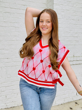 Heart Knit Sweater Vest with Bows- BOW, Bow detail, bow sweater, BOWS, clothing, HEART, heart sweater, HEARTS, knit sweater, knit vest, pink, pink sweater, RED, RED SWEATER, ribbon, Ribbons, Seasonal, sweater top, SWEATER VEST, SWEATER., sweaters, Tops, VALENTINE, Valentine Collection, valentine pullover, VALENTINES, VALENTINES GRAPHIC TEE, valentines sweatshirt, VALENTINES TOP, VEST-Ace of Grace Women's Boutique