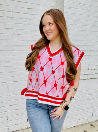 Heart Knit Sweater Vest with Bows- BOW, Bow detail, bow sweater, BOWS, clothing, HEART, heart sweater, HEARTS, knit sweater, knit vest, pink, pink sweater, RED, RED SWEATER, ribbon, Ribbons, Seasonal, sweater top, SWEATER VEST, SWEATER., sweaters, Tops, VALENTINE, Valentine Collection, valentine pullover, VALENTINES, VALENTINES GRAPHIC TEE, valentines sweatshirt, VALENTINES TOP, VEST-Ace of Grace Women's Boutique