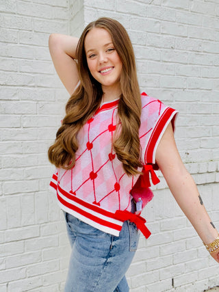 Heart Knit Sweater Vest with Bows- BOW, Bow detail, bow sweater, BOWS, clothing, HEART, heart sweater, HEARTS, knit sweater, knit vest, pink, pink sweater, RED, RED SWEATER, ribbon, Ribbons, Seasonal, sweater top, SWEATER VEST, SWEATER., sweaters, Tops, VALENTINE, Valentine Collection, valentine pullover, VALENTINES, VALENTINES GRAPHIC TEE, valentines sweatshirt, VALENTINES TOP, VEST-Ace of Grace Women's Boutique