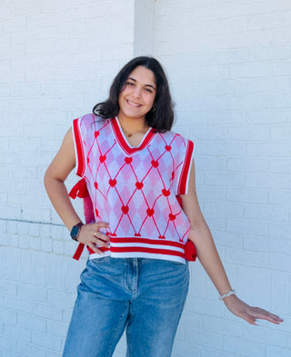 Heart Knit Sweater Vest with Bows- BOW,Bow detail,bow sweater,BOWS,clothing,HEART,heart sweater,HEARTS,knit sweater,knit vest,pink,pink sweater,RED,RED SWEATER,ribbon,Ribbons,Seasonal,sweater top,SWEATER VEST,SWEATER.,sweaters,Tops,VALENTINE,Valentine Collection,valentine pullover,VALENTINES,VALENTINES GRAPHIC TEE,valentines sweatshirt,VALENTINES TOP,VEST-Ace of Grace Women's Boutique