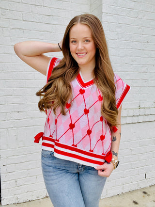 Heart Knit Sweater Vest with Bows- BOW, Bow detail, bow sweater, BOWS, clothing, HEART, heart sweater, HEARTS, knit sweater, knit vest, pink, pink sweater, RED, RED SWEATER, ribbon, Ribbons, Seasonal, sweater top, SWEATER VEST, SWEATER., sweaters, Tops, VALENTINE, Valentine Collection, valentine pullover, VALENTINES, VALENTINES GRAPHIC TEE, valentines sweatshirt, VALENTINES TOP, VEST-Ace of Grace Women's Boutique